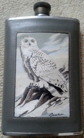 J & J Cash leather covered fask with a woven Snowy Owl tapestry