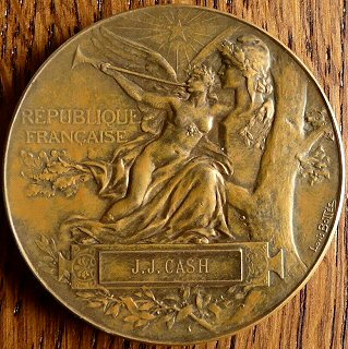 obverse view of 1889 Exposition Universelle medal awarded to J & J Cash
