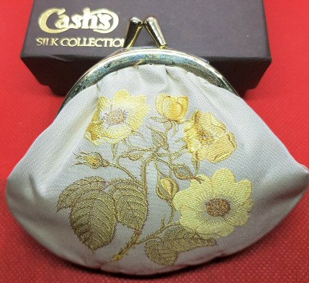 J & J Cash pin cushion with woven image of roses