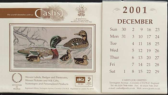 J & J Cash woven picture of a pair of mallard ducks with their young, with tear off printed calendar for the year 2001