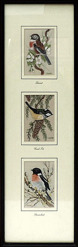 J & J Cash woven picture with three pictures in one frame; being Linnet, Coal Tit & Stonechat birds