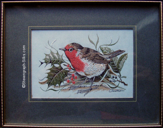 J & J Cash woven picture of a bird, with no words, but image of a robin