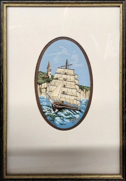 J & J Cash small oval centred woven picture with image of a sailing ship