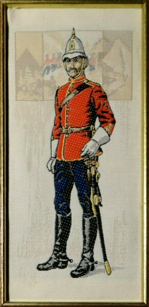 J & J Cash woven picture with image of a North West Mounted Policeman dressed in 1896 uniform