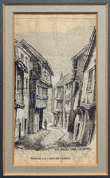 J & J Cash woven scenic picture of an old street view