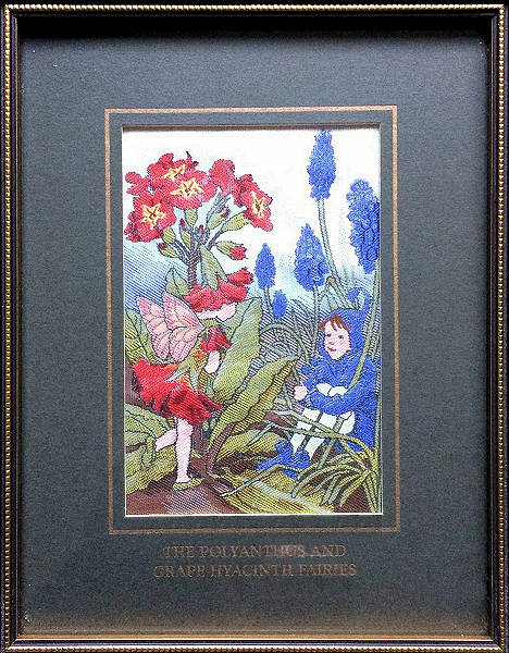 J & J Cash woven picture with THE POLYANTHUS & GRAPE HYACINTH FAIRIES title words, and image of a red fairy and a blue fairy with red and blue flowers
