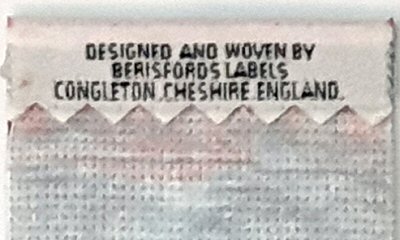 woven name at top turn-over of bookmark