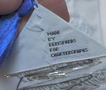 woven name at bottom turnover of the bookmark