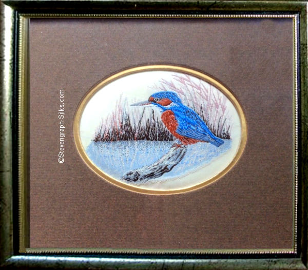 Framed woven picture of a Kingfisher, perched on a branch