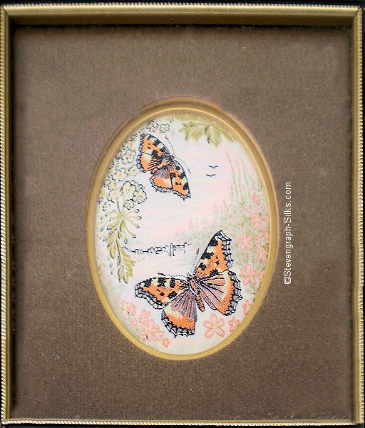 Framed woven picture of a pair of Small Tortoiseshell butterflies