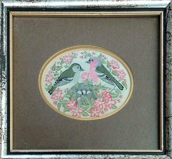Framed woven picture of a pair of Chaffinchs & three eggs