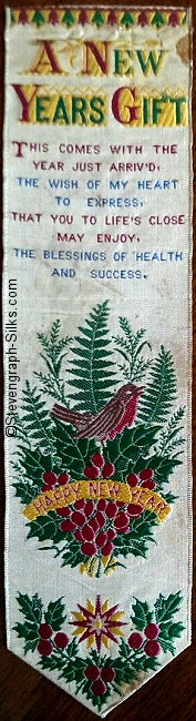 Bookmark with title words, words of verse, and image of robin in fern frongs and flowers
