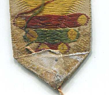 reverse pointed end of this bookmark, with difficult to read letters