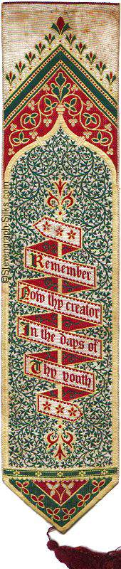 Ornate bookmark with ribbon on which are words