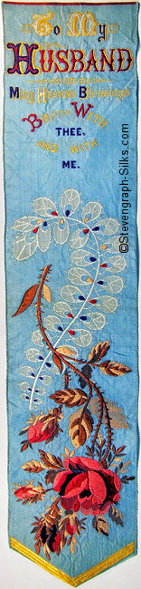 Silk bookmark with title words and image of red rose and fern frond