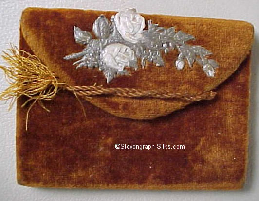 front view of needle case showing silk rope used to hold it closed