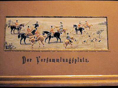 Image of the groups of horses, riders and fox hunting hounds, waiting to start the hunt, with German words on card mount