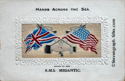 image of shaking hands, flags and tassles